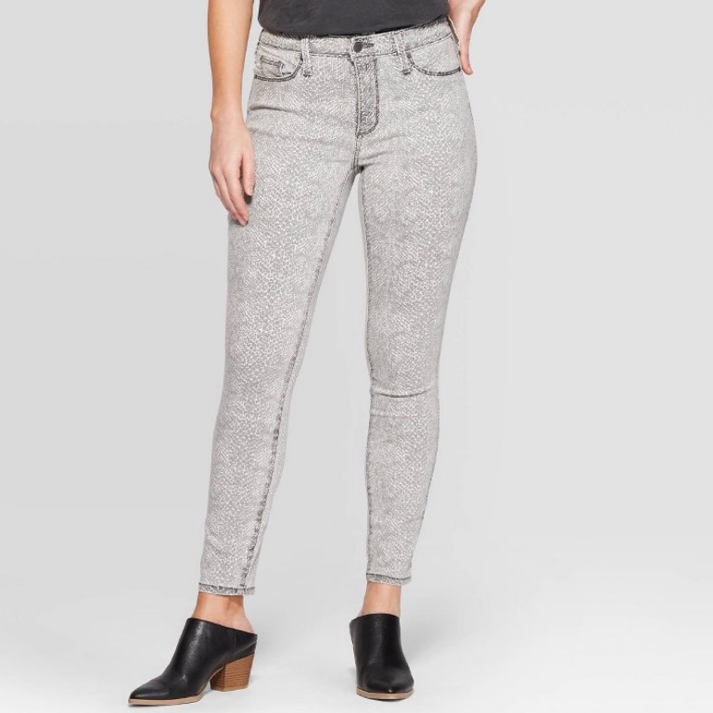 Snakeskin print skinny jeans